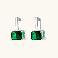 Emerald green zirconia geometric drop earrings in polished white gold plated setting | Olaty