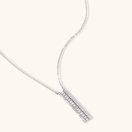 Baguette zirconia linear bar pendant necklace with clear stone side accents | Olaty