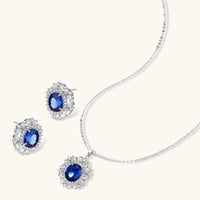 Sapphire blue halo necklace and matching stud earrings in silver tone | Olaty