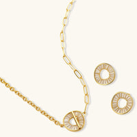 Asymmetric chain necklace with clear Zirconia circular pendant and matching stud earrings | Olaty