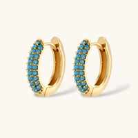 Turquoise Zirconia Huggie Hoop Earrings with curved pavé-style stone setting | Olaty