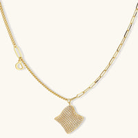 Asymmetric chain necklace with pavé wave pendant in gold tone | Olaty