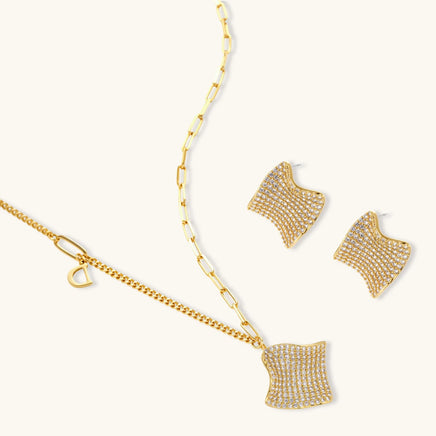 Sculptural wave necklace and matching pavé stud earrings with clear zirconia | Olaty