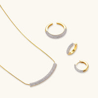Pavé Zirconia crescent necklace with matching huggie earrings and adjustable ring | Olaty