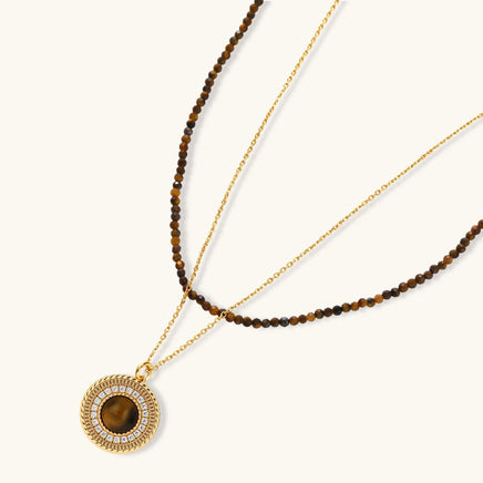 Tiger eye round pendant necklace layered with brown beaded necklace | Olaty