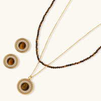 Tiger eye jewelry set with round halo pendant, layered beaded necklace and matching stud earrings | Olaty