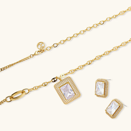 Emerald cut Zirconia pendant necklace and rectangular stud earrings displayed together | Olaty