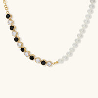 Pearl necklace with alternating black and clear zirconia halo stones | Olaty