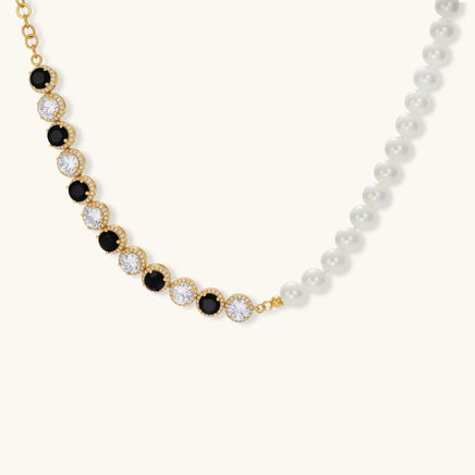 Pearl necklace with alternating black and clear zirconia halo stones | Olaty