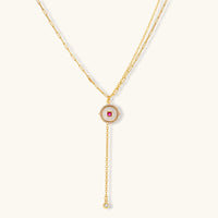 Ruby-red Zirconia medallion Y-drop necklace with layered gold-tone chains | Olaty
