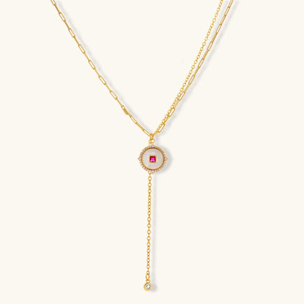 Ruby-red Zirconia medallion Y-drop necklace with layered gold-tone chains | Olaty