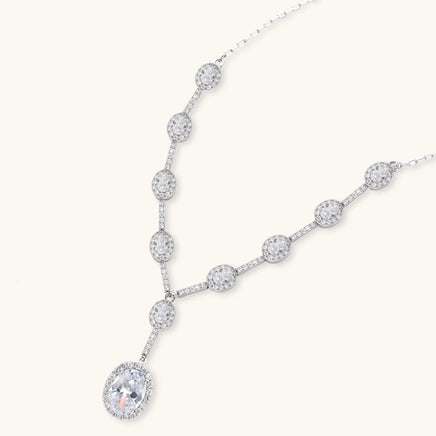 Celestial Cascade Y-shaped necklace with oval zirconia pendant and halo stones | Olaty