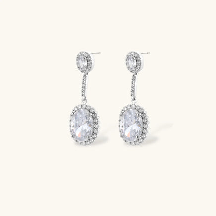 Oval zirconia halo drop earrings with sparkling stone-set connectors | Olaty