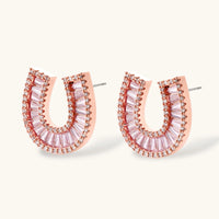 Pink and clear Zirconia horseshoe stud earrings close-up | Olaty