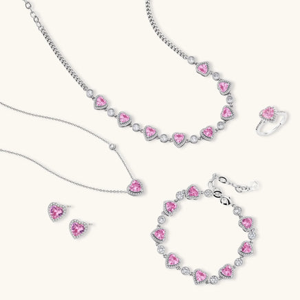 Pink heart zirconia jewelry collection with two necklaces, bracelet, earrings and ring | Olaty