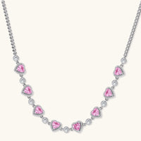 Pink heart zirconia statement necklace with clear accent stones and silver tone chain | Olaty