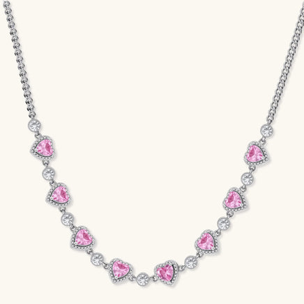 Pink heart zirconia statement necklace with clear accent stones and silver tone chain | Olaty
