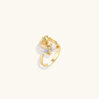 Sculptural Baroque Pearl rose statement ring with gold-plated floral cage shown at an angled view | Olaty