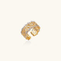 Two-tone lattice crystal statement ring with gold-tone geometric openwork and zirconia details, angled view | Olaty