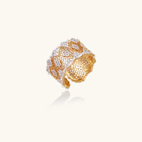 Honeycomb crystal statement ring with gold-tone openwork lattice and zirconia details, angled view | Olaty