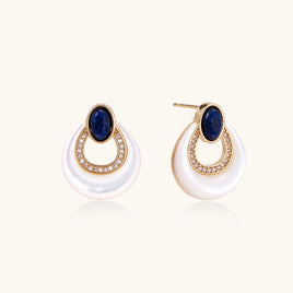 Lapis Lazuli and Mother of Pearl stud earrings with gold-tone teardrop frames and sparkling accents, angled view | Olaty