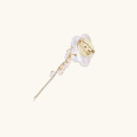 Back view of Pearl Cascade Pansy Brooch showing gold-tone pin fastening, carved shell flower and pearl cascade | Olaty