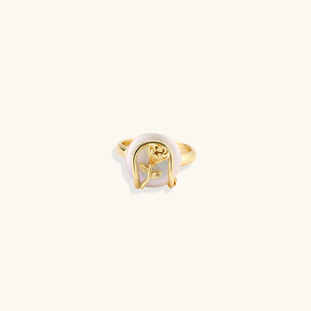 Sculptural Baroque Pearl statement ring with gold rose motif shown from the front | Olaty