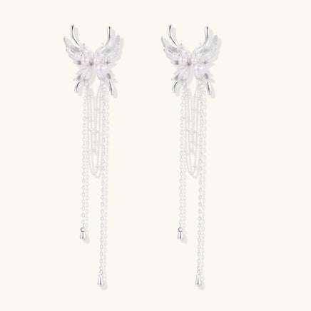 Celestial Phoenix pearl cascade statement earrings with sculptural wings and flowing chains front view | Olaty