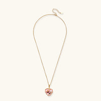 Full view of pink heart pendant necklace with delicate gold chain and floral design | Olaty
