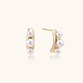 Pearl Trio Curve stud earrings with three freshwater pearls and 14K gold-plated curved design angled view | Olaty