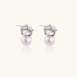 Stardust pearl drop earrings with geometric crystals and freshwater pearls angled side view | Olaty