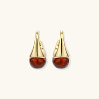Amber sculptural drop earrings with glossy resin drops shown from the front | Olaty