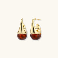 Amber sculptural drop earrings with polished gold curves and translucent resin drops, front and side view | Olaty