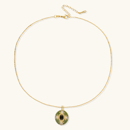 3. Full view of emerald green oval pendant necklace with gold chain and adjustable extender | Olaty