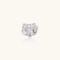 Silver-toned orchid ring with textured petals, pearl center accents, and sparkling zirconia stones on white background.