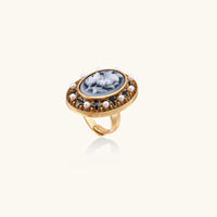 Angled view of Victorian floral cameo statement ring with shell pearl accents and ornate detailing | Olaty