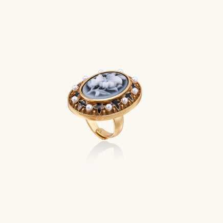 Angled view of Victorian floral cameo statement ring with shell pearl accents and ornate detailing | Olaty