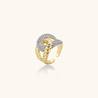 Angled view of sculptural chain link statement ring with gold-tone links and sparkling zirconia | Olaty