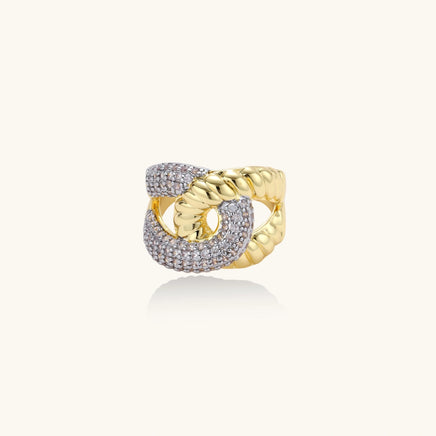 Front view of chain link statement ring with intertwined gold-tone and zirconia-covered links | Olaty