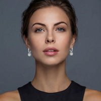 Moissanite Spark Twisted Infinity Halo Earrings | Olaty