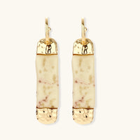Front view of rectangular marbled resin drop earrings with gold-tone caps and hoops | Olaty