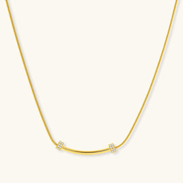 Curved Spark Bar Necklace with gold snake chain and crystal accented curved bar | Olaty