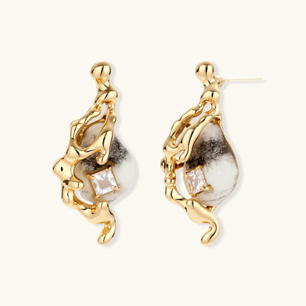 Mystic serpent drop earrings with flowing gold-tone forms, marbled teardrop centers and square zirconia accents | Olaty