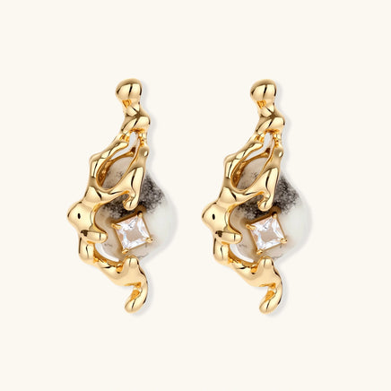 Front view of gold-tone serpent drop earrings featuring marbled teardrop centers and clear square zirconia accents | Olaty