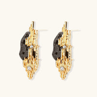 Side view of sculptural gold-tone earrings showing dark resin accents, rhinestones and S925 posts | Olaty