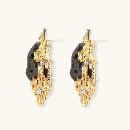 Side view of sculptural gold-tone earrings showing dark resin accents, rhinestones and S925 posts | Olaty
