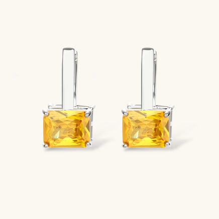Pair of drop hoop earrings with golden yellow square zirconia stones | Olaty