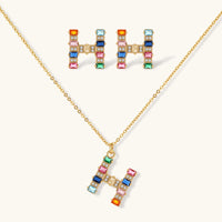 Rainbow zirconia H initial pendant necklace with matching H initial earrings | Olaty