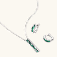 Emerald green baguette and clear zirconia pendant necklace with matching hoop earrings | Olaty