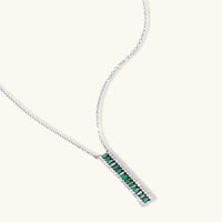 Emerald green baguette zirconia linear pendant necklace with clear zirconia border | Olaty